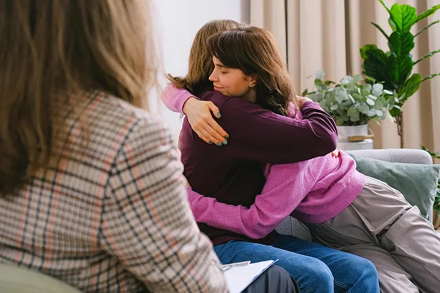 psychotherapy clients hugging